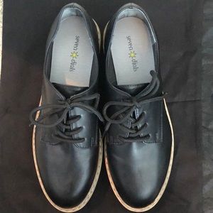 Black platform loafers